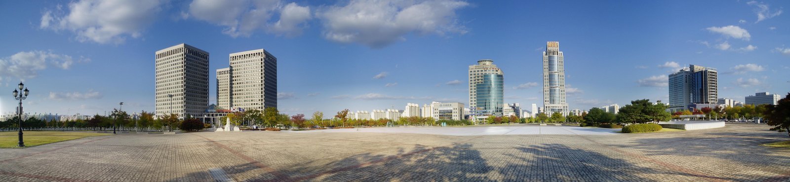 Panoramic view of the Government Complex Daejeon across an open paved plaza